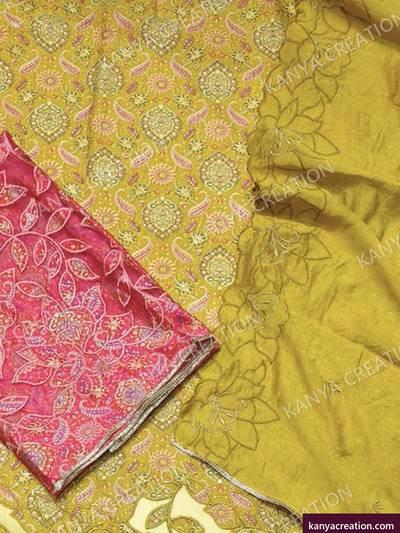 Airport Fancy 2027 (detail) — yellow unstitched suit set with fancy embroidery by Kanya Creation, Ahmedabad