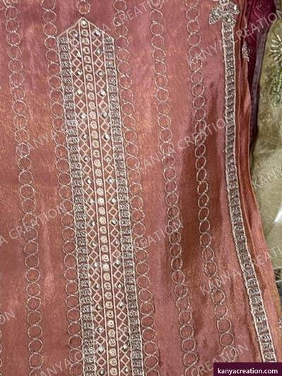 Gossip Fancy 2027 (detail) — red unstitched suit set with fancy embroidery by Kanya Creation, Ahmedabad