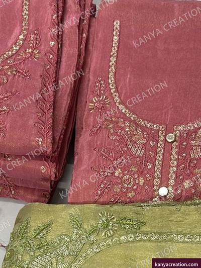 Tarzan Fancy 2027 (detail) — red unstitched suit set with fancy embroidery by Kanya Creation, Ahmedabad